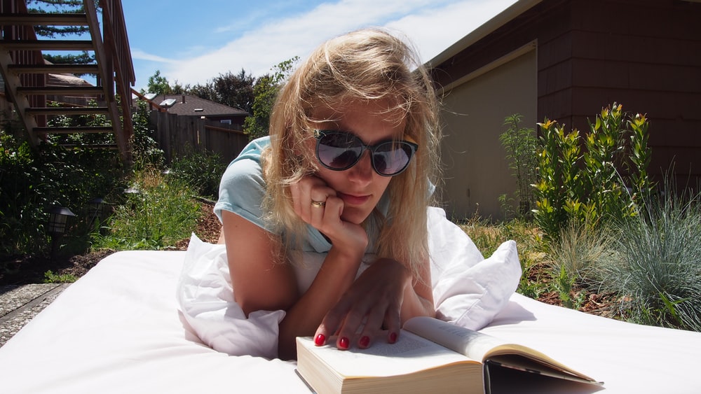 woman reading book